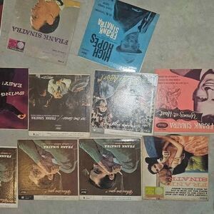 52 Records (29 Frank Sinatra 45's, 19 Jonny Mathis 45's, 4 random LP's